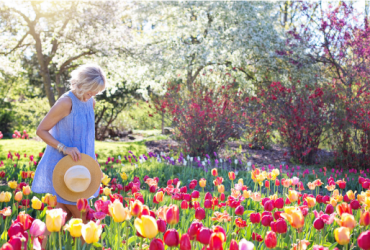 Woman walking in flowers